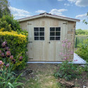 Abri 6,16m² en bois massif 28mm avec toiture en plaques ondulées HABRITA