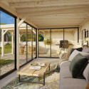 Pavillon de jardin en bois brut 876x588cm Lenna - madriers 28mm - terrasse 17,64m² avec comptoir - Palmako