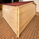 Abri en bois massif 12m² – madriers 28mm + couverture plaques ondulées