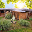 Pool house en bois thermo traité 12,31m² BLUETERM, 2 parois avec ventelles et 2 parois avec comptoirs - HABRITA