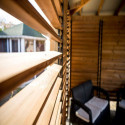 Pool house en bois thermo traité 12,31m² BLUETERM, 2 parois avec ventelles et 2 parois avec comptoirs - HABRITA